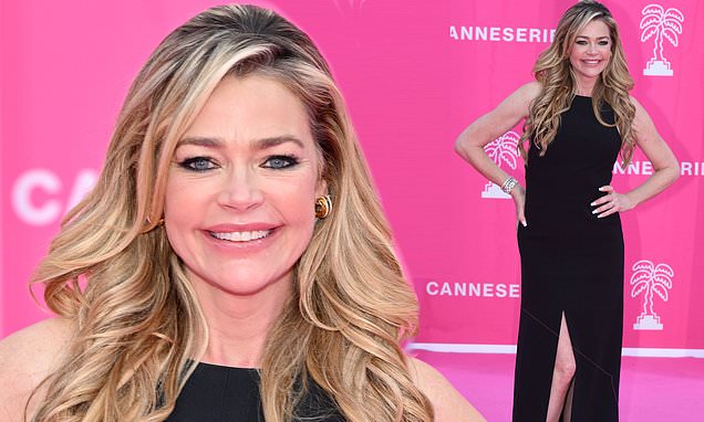 Denise Richards Shows Off Her Toned Legs In A Black Gown With A Plunging Thigh High Slit At The 2023