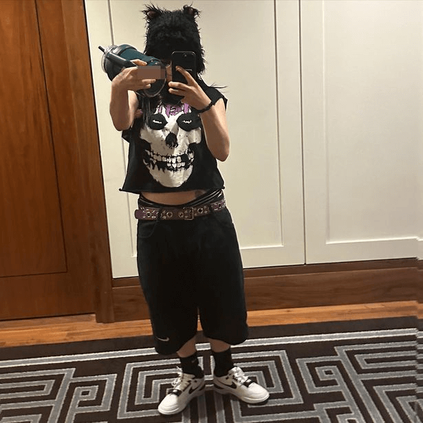 In low shorts and a crop top, Billie Eilish exposes her midriff for tongue-out photos