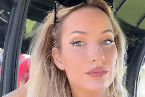 Paige Spiranac Flashes A Cheeky Smile At Camera While Wearing An Extremely Low Cut Green Top 0311