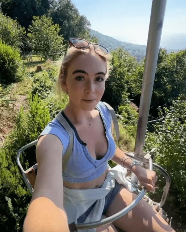 While wearing a blue low-cut shirt and jean shorts, she posed and made faces at the camera while showing off her hike in Monte Solaro.