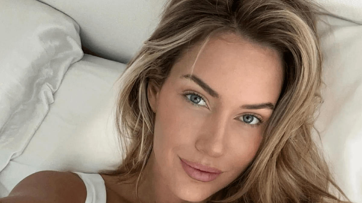 In a skin-tight gym gear, Paige Spiranac sprawled on a bed as fans say, ‘and I thought you couldn’t get prettier than this’