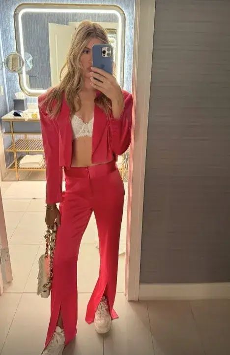 Bouchard posted an Instagram story photo of herself wearing a red suit with a white bra, along with a video of Kendrick Lamar performing at a Visa Cash App launch in Las Vegas.