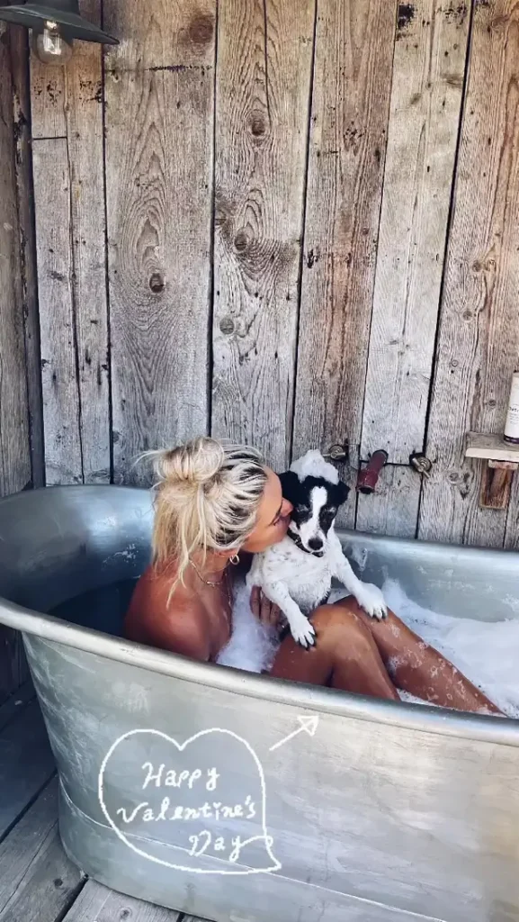 Taking part in a Valentine's Day bath photo with a special someone, blonde beauty Danni Menzies looked stunning as she stripped off to soak up the bubbles.