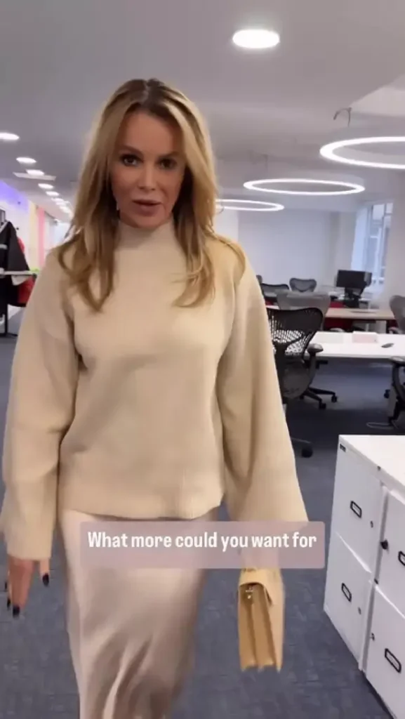 As Amanda Holden slipped into a cream jumper and silk satin skirt to show off her endless legs, she nearly exposed too much.