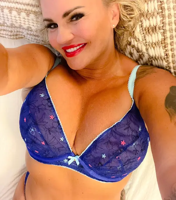 Kerry Katona's new Instagram post revealed her killer curves in a see-through blue bra and matching knickers.