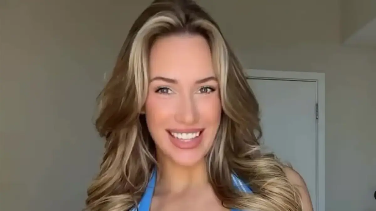 Paige Spiranac looked stunning in a low-cut blue top while sharing some ‘great tips’ on how to get better at golf