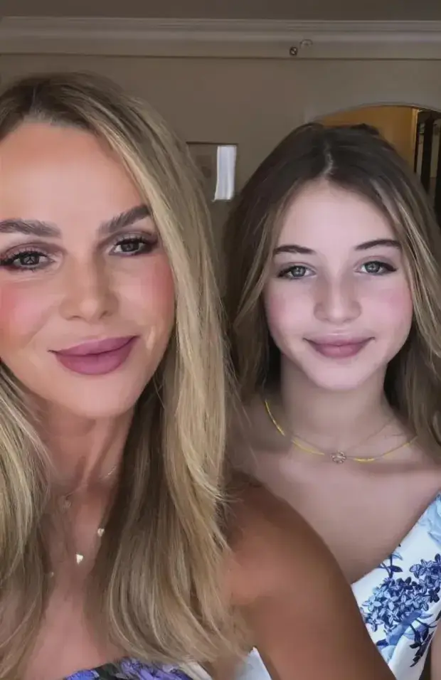 Amanda Holden shares the moment she and her lookalike daughter, Hollie, prepare for a friend's wedding at the end of May.