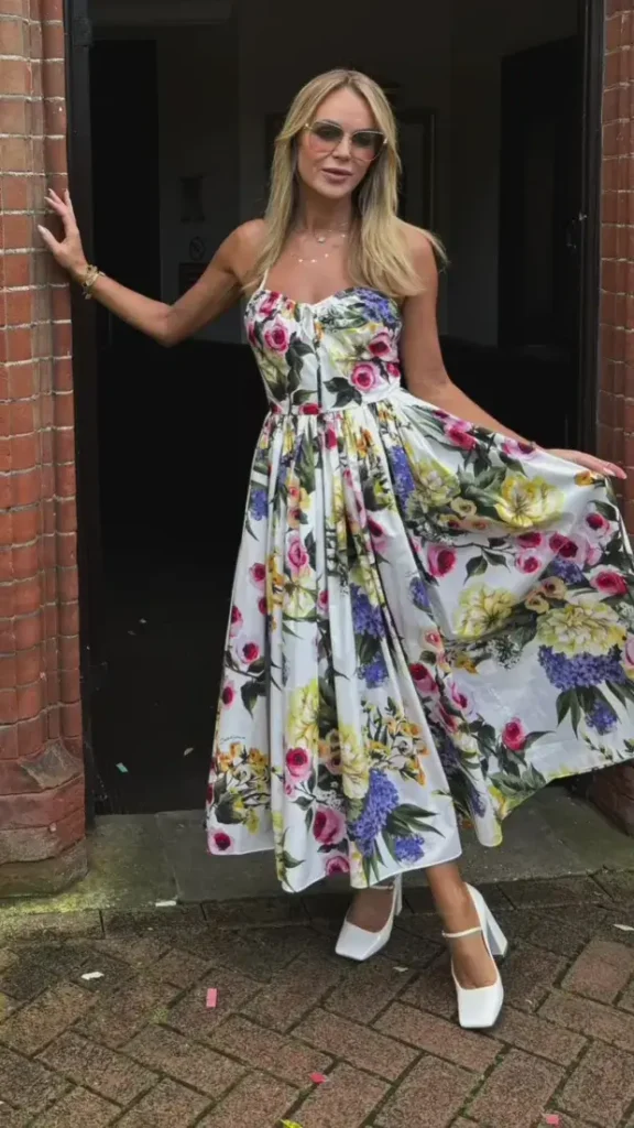 In a picture shared on Instagram, Amanda Holden shares the moment she and her lookalike daughter, Hollie, 12, prepare for a friend's wedding.