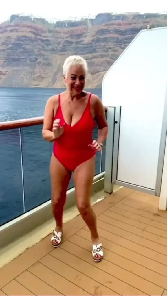 Denise Welch looked sensational in a red-hot swimsuit to celebrate her birthday in the style of Pamela Anderson.