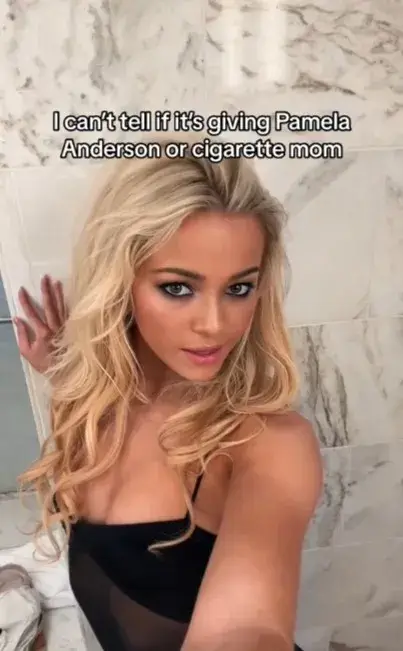 "I can't tell if it's giving Pamela Anderson or cigarette mom," she captioned the post.
