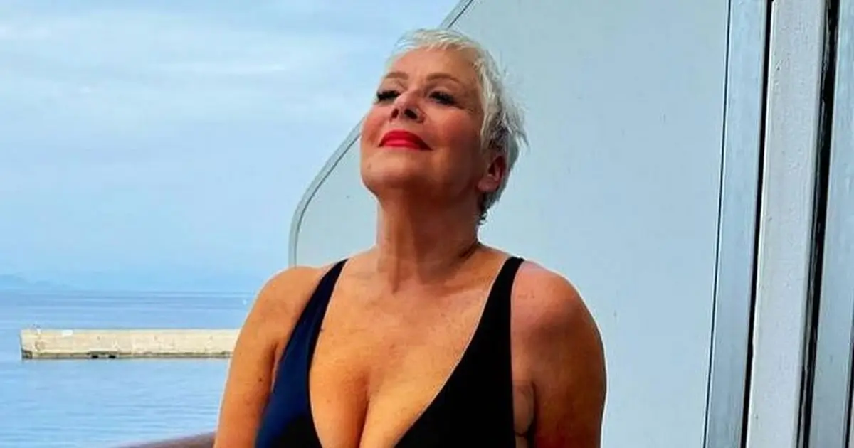 In a low-cut clinging swimming costume, Denise Welch wowed her fans while on a sun-soaked cruise