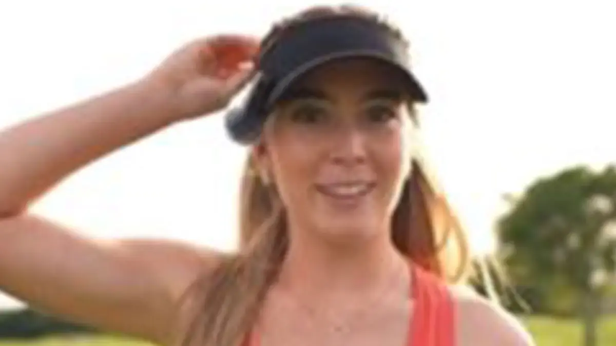 Braless Grace Charis, 21, in a deep cut orange top when she birdies hole and followers call her ‘more than just a pretty girl’