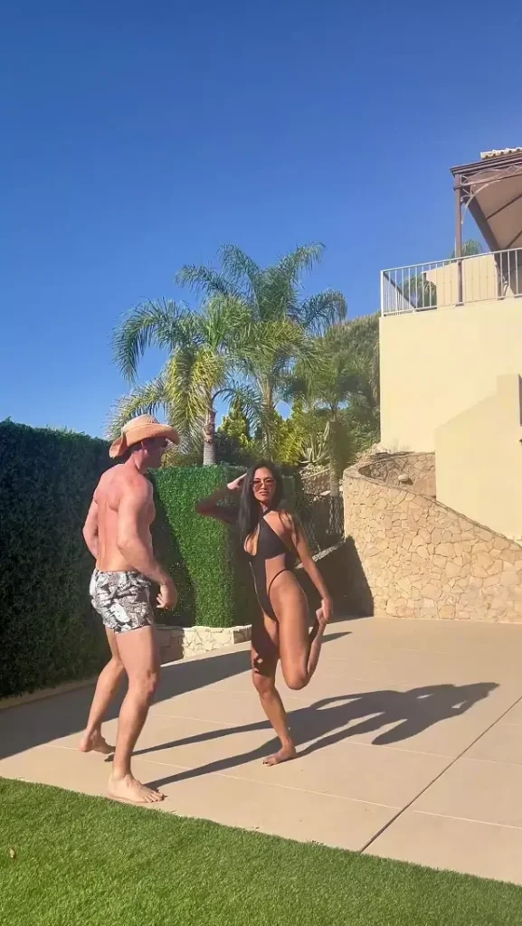 In her tiniest black cut-out swimsuit yet, Nicole Scherzinger danced around with her fiancé Thom Evans to the delight of fans.