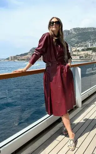 Maria Sharapova looks stunning  as she posed in an elegant leather outfit at the Monaco Grand Prix.