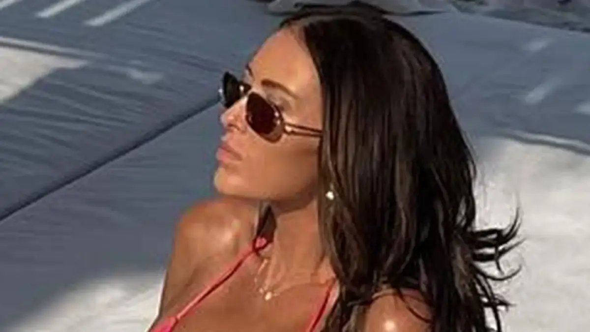 Paulina Gretzky stunned in a revealing pink bikini as she puts on busty display for two mirror selfies