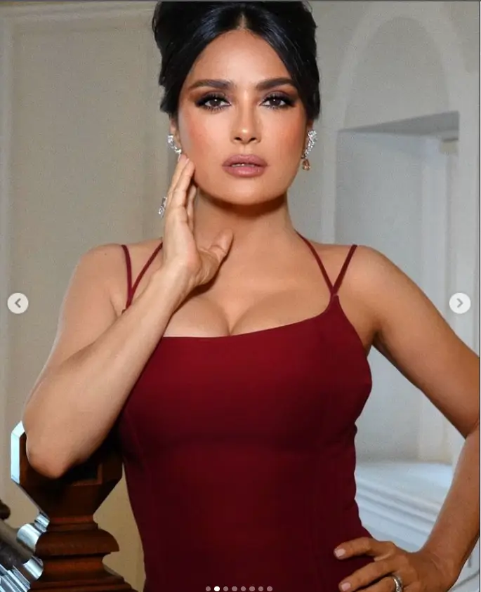 Salma Hayek wore a daringly plunging red cocktail dress to the Fashion Trust Arabia dinner in celebration of the 2023 FTA Prize winners