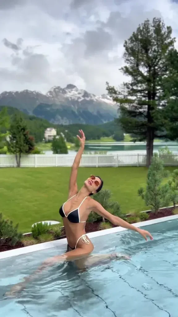 Nicole Scherzinger stripped down to a black bikini to show off her stunning body as she celebrated her 46th birthday