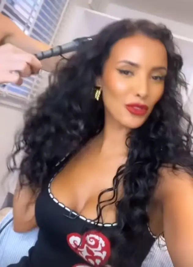 On Sunday night, Maya Jama returned to her Love Island Aftersun hosting duties in a black mini dress showing off her curves and wearing sheer tights.