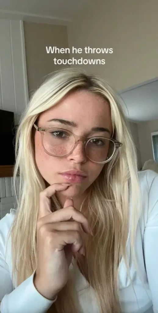 In her most recent TikTok post, Dunne posted three selfies wearing a white shirt and sunglasses.