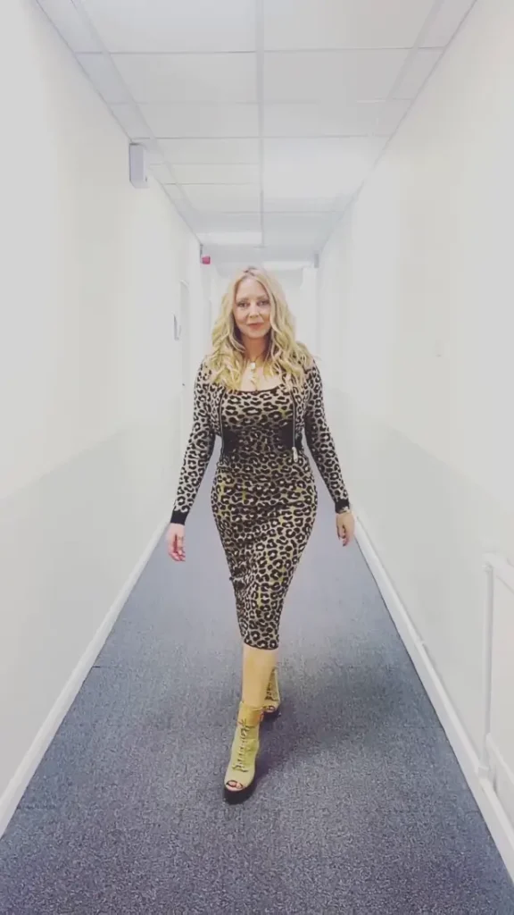 Carol Vorderman turned heads with a slow-motion video of herself in a figure-hugging leopard print dress. 