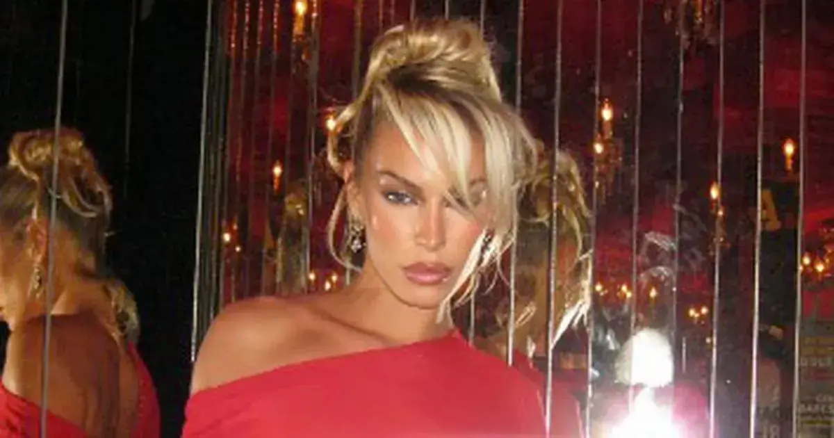 ‘World’s hottest football WAG’ Jessica Goicoechea wows in a risqué red see-through dress to announcing new deal