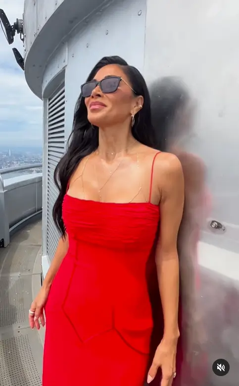 The 46-year-old singer Nicole Scherzinger looked sleek and chic in a fiery red dress with spaghetti straps and heels in New York City.