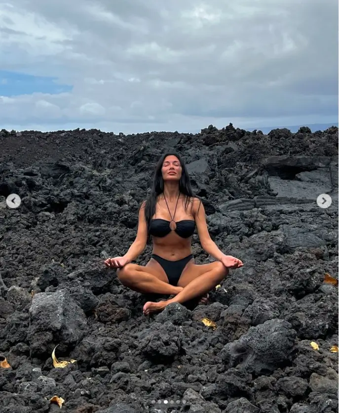 During a spiritual session of meditation on black volcanic rock, Nicole Scherzinger stripped down to a barely-there bikini as she flaunted her jaw-dropping figure in Hawaii.