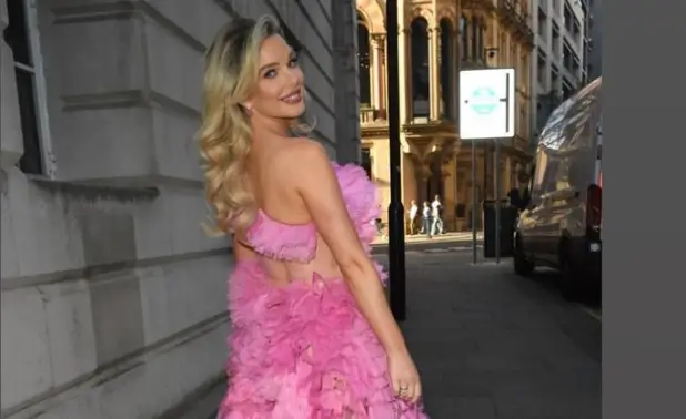 Helen Flanagan, 34, stunned in a pink ruffled dress and swept back blonde hair in a Hollywood starlet style and flawless makeup