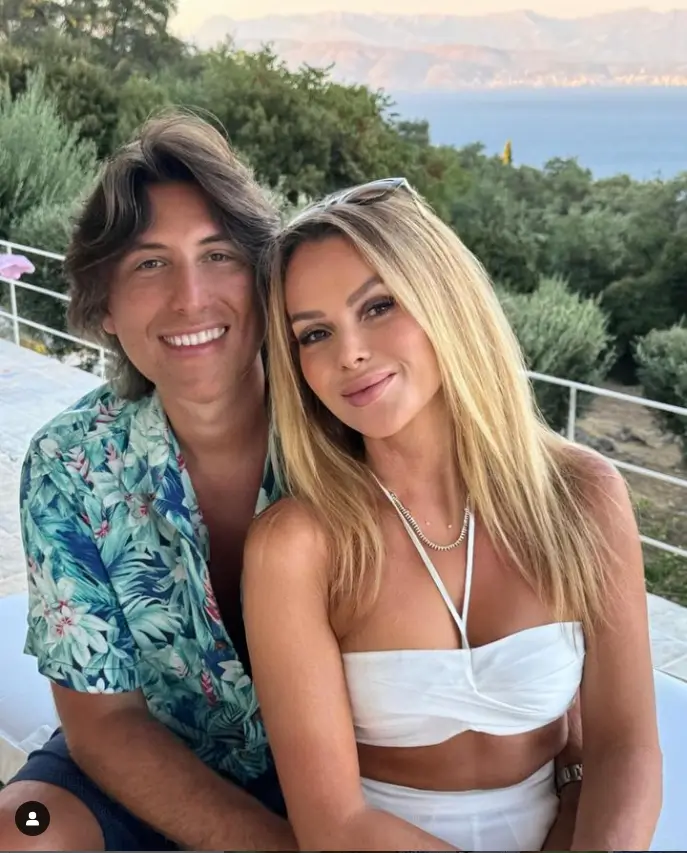 A rare photograph of Amanda Holden and Chris Hughes on their family holiday in Corfu, Greece, was shared this weekend.