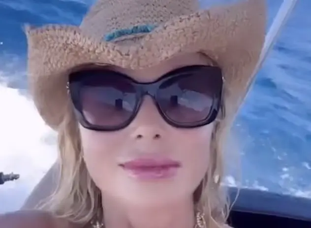 Amanda Holden, 53, slips into a skintight metallic swimsuit as she makes ‘unusual’ confession