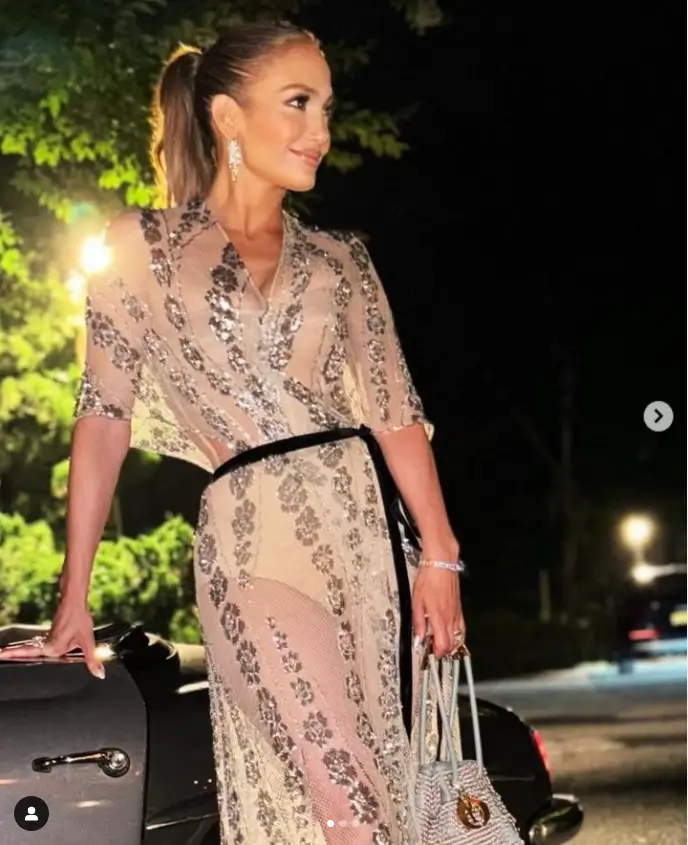 Instead of happy 52nd birthday wishes for Ben Affleck on Thursday, Jennifer Lopez shared a series of stunning portraits of herself wearing a sheer Dior dress.