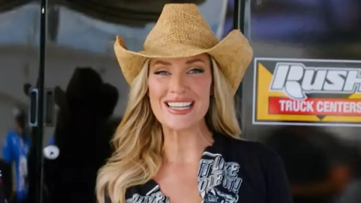 Paige Spiranac in a low-cut top that was teamed with a stylish hat and tight jorts to made for a look many fans loved when she headed to the Nascar paddock