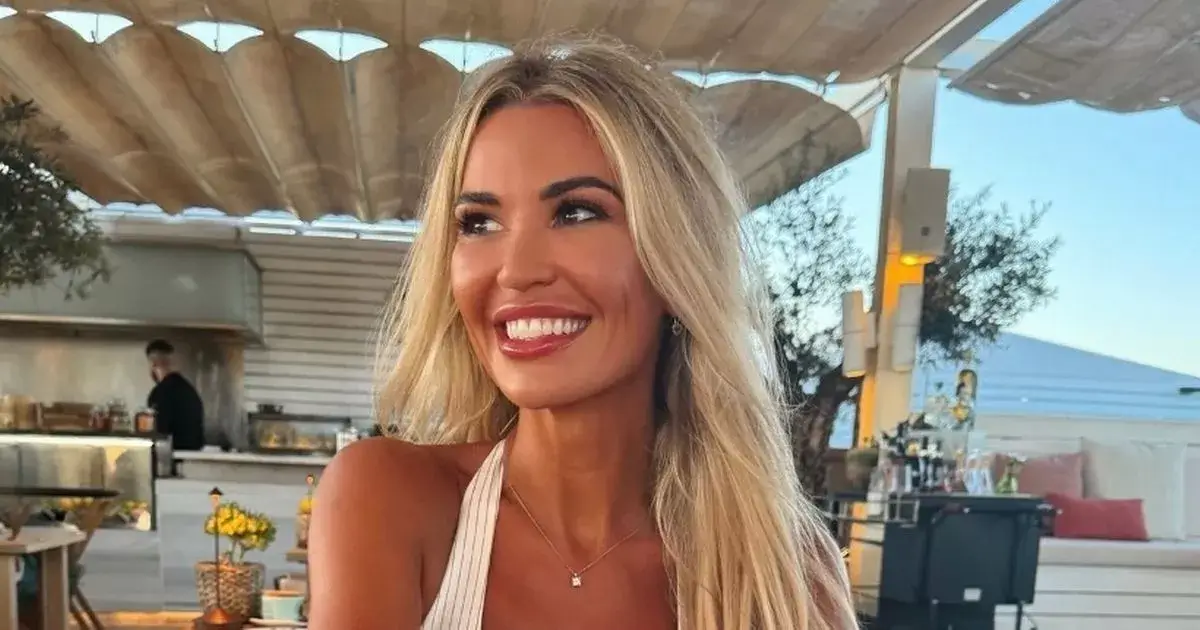 Christine McGuinness, 36, showed off abs in a black bikini with dramatic cutouts after a romance riddle