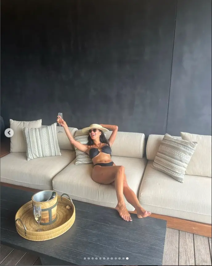 Additionally, Nicole posed with a flute while wearing a black halterneck bikini while enjoying a cheeky tipple.