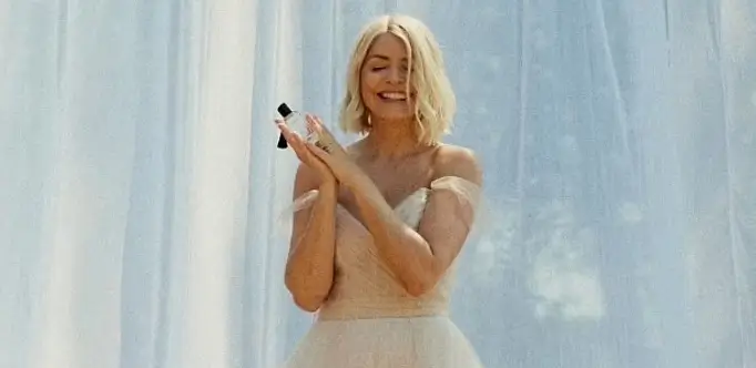 Holly Willoughby looked incredible in a stunning white gown as she promoted her latest fragrance