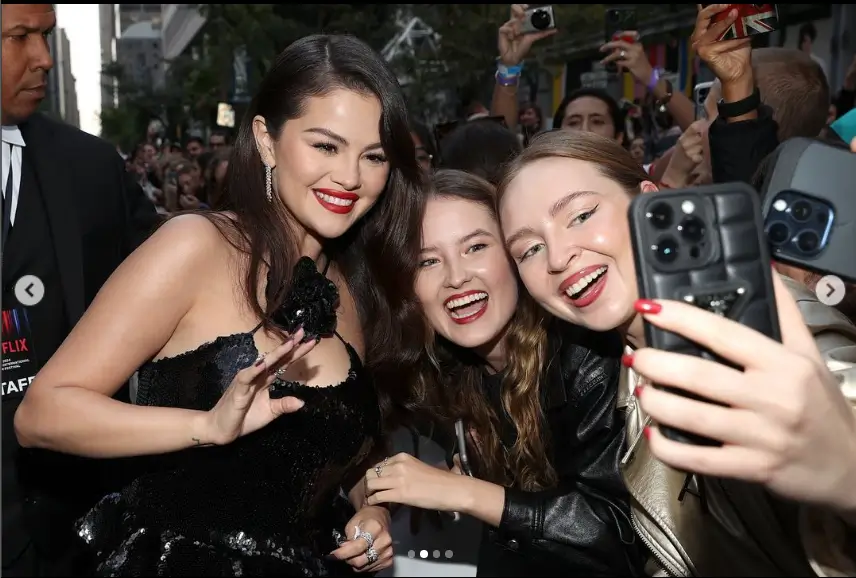 In a sequin dress, Selena Gomez was seen out with a smile on her face during the premiere of Emilia Perez, her upcoming movie.