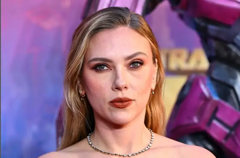 Scarlett Johansson glams up the Transformers One London premiere in a strapless figure-hugging red dress