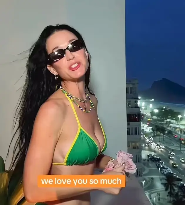 In a tiny green bikini, Katy Perry flaunted her sculpted abs on the balcony of her hotel after performing at Rock in Rio