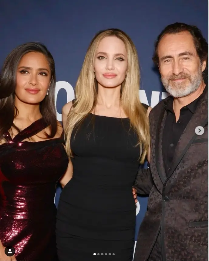 As part of TIFF's day four, she posed alongside Mexico's flag and was eventually joined on the red carpet by her co-star Demián Bichir and Angelina Jolie for a few poses.