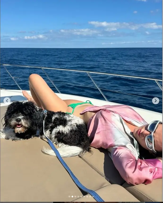 Sunbathing on a yacht, Bella displayed her sensational figure by soaking up the rays in teeny green bikini bottoms while flaunting her toned legs and abs.