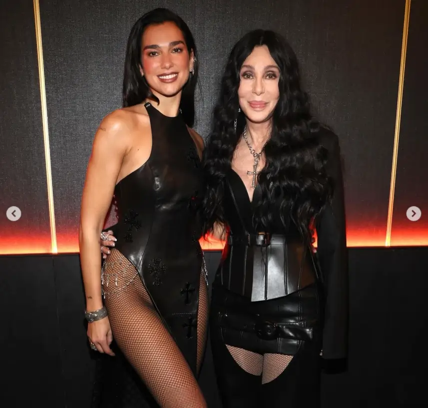 During the star studded event, Dua Lipa joined Cher and Demi Lovato on stage to kick off the performances. It was an incredible night for Dua's career as she held hands with Cher after their performance together.