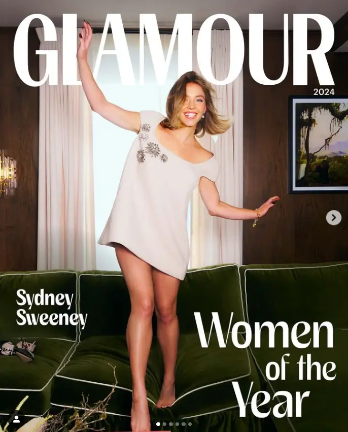 Sydney Sweeney showed off her abs in an eye-catching red wig and tiny crop top as she graced the front cover of magazine