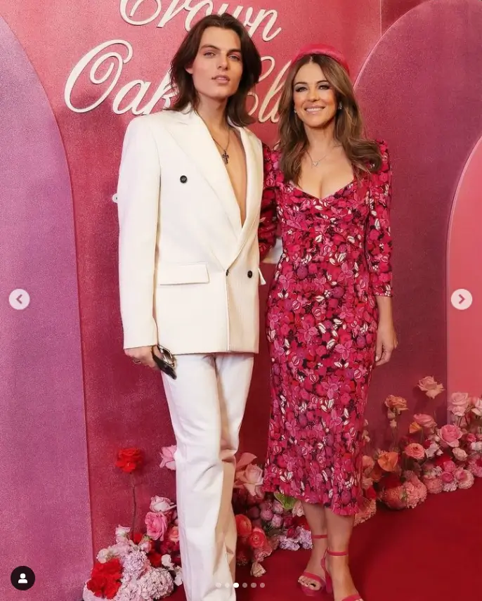 Liz's fans swooned over the figure-hugging floral dress she wore last week, along with her director son Damian, who went topless under a stylish white blazer.