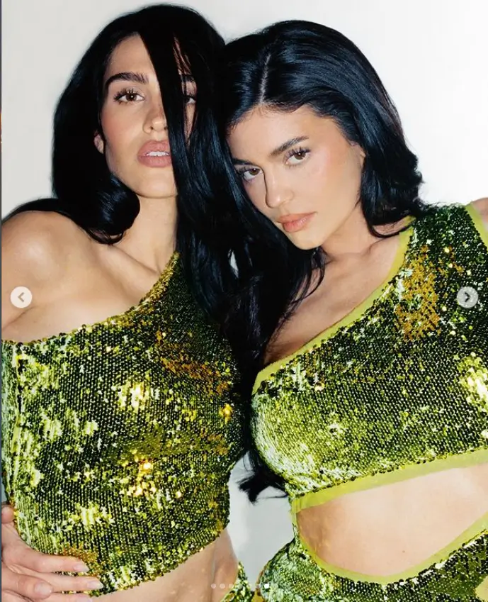 Kylie Jenner wearing an off-the-shoulder crop top and micro shorts that exposed her toned midriffs for Khy's latest campaign