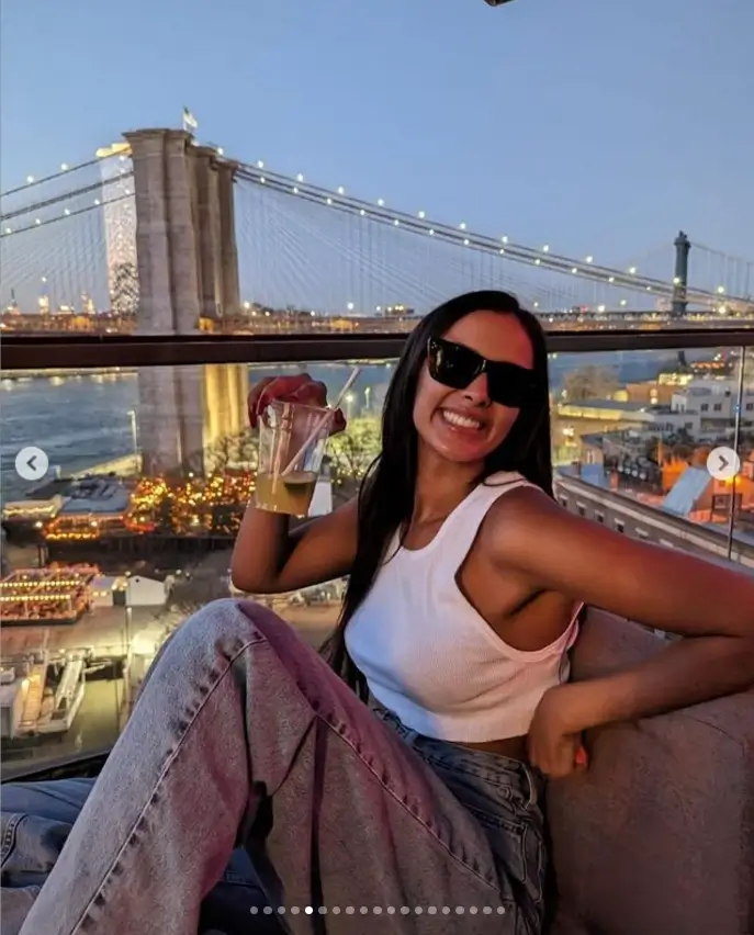 During her night out at a rooftop bar, Maya looked effortlessly stylish in a white crop top and wide legged grey jeans. She exuded casual cool while sipping on cocktails, as captured in another picture.