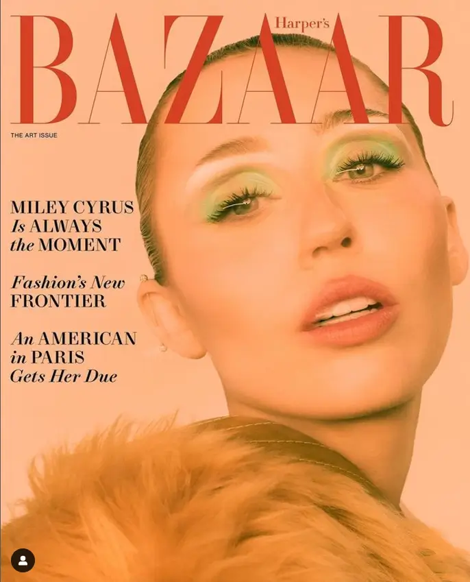 Miley Cyrus confidently showed off her collection of tattoos while donning a dazzling gold leotard for the cover of Harper's Bazaar magazine for the December/January issue.