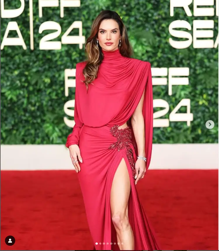 At the closing night of a star-studded movie celebration, Alessandra Ambrosio dazzled in a split dress that showcased her stunning figure and fashion sense. With all eyes on her, she proved once again why she is a top model in the industry.