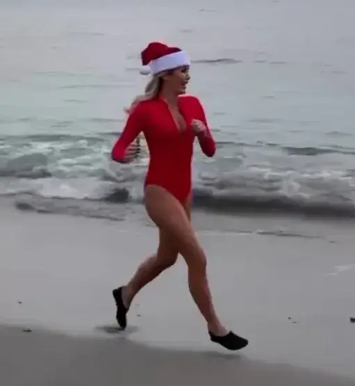 In a comical video with Alan Carr, the 53-year-old actress excited her fans with a clip of her running on the beach wearing a flattering one-piece.