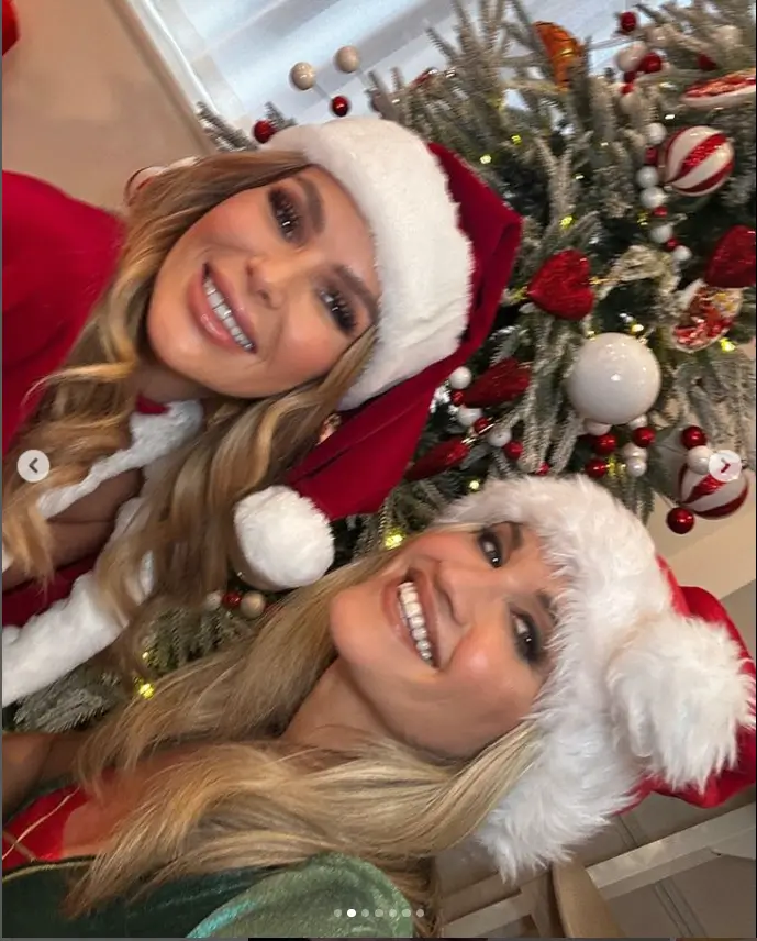 As they celebrated the beginning of Advent, both Amanda and Ashley Roberts stood out in stunning ensembles. Amanda's red strapless Santa dress, complete with a white fur trim, sizzled and caught everyone's attention.