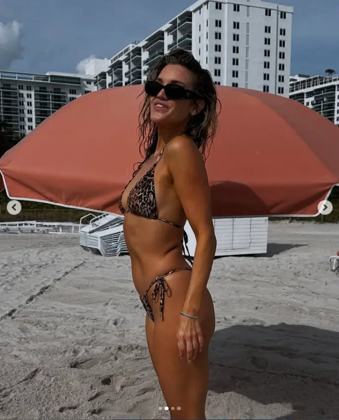 The gorgeous 43-year-old former Pussycat Doll singer stunned in a chic triangle top and coordinating bottoms, showcasing her beauty as she struck a pose on the beach.